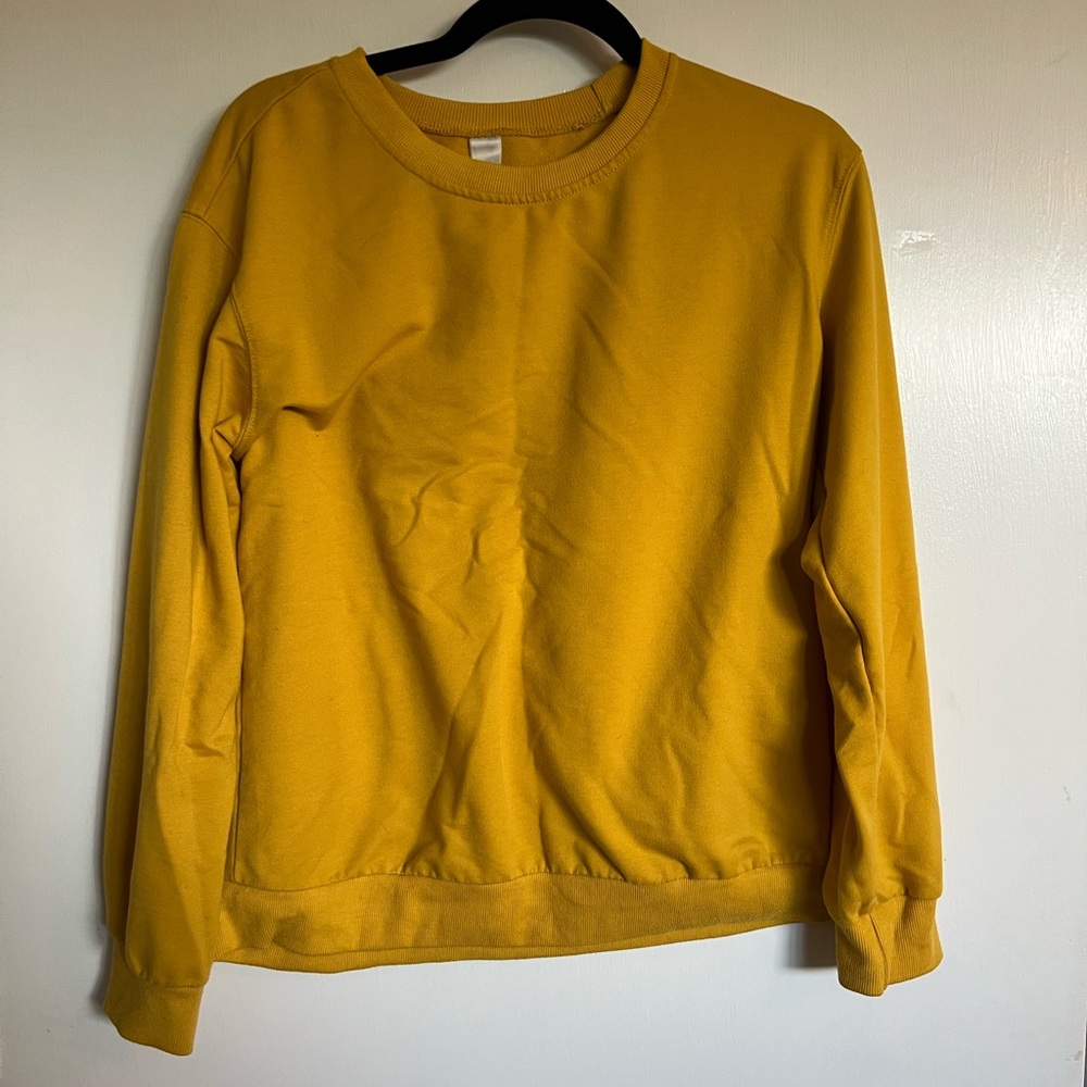 yellow sweatshirt